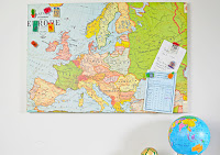 http://www.pillarboxblue.com/upcycled-map-magnetic-board/