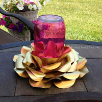 http://www.plumperfectandme.com/2016/06/recycled-sodabeer-cans-candle-holder.html