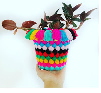 http://setfreemygypsysoul.blogspot.co.uk/2016/06/Free-fast-crochet-pattern-popcorn-bobble-stitch-plant-pot-cozy-sock.html