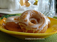 https://frommycarolinahome.wordpress.com/2016/04/18/lemon-donuts-with-lemon-glaze/