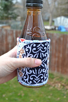 http://www.marymarthamama.com/crafty-cat/insulated-drink-cozy-tutorial/