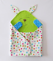 http://sewtoy.com/free-toy-sewing-pattern/cute-and-colorful-baby-blanket-and-baby-toy-all-in-one/