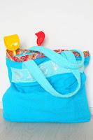 http://theseamanmom.com/towel-beach-bag-tutorial/