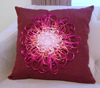 http://www.plumperfectandme.com/2016/03/ribbon-flower-embellished-napkin-pillow.html