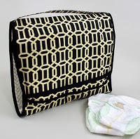 http://theinspiredwren.blogspot.com/2016/04/tutorial-on-the-go-diaper-caddy-changing-pad.html