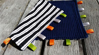 http://www.ninamakes.com/2016/03/sewing-for-boys-baby-taggie-blanket.html