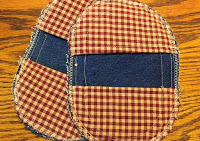 http://hangryfork.com/sewing-projects/old-jeans-make-denim-potholders/