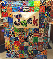 http://hangryfork.com/sewing-projects/jacks-i-spy-baby-quilt-with-applique/