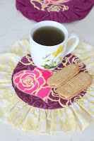 http://theseamanmom.com/valentine-mug-rug-tutorial/