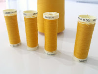 http://www.makery.uk/2016/01/top-tip-transfer-thread-from-large-cones-to-small-spools/