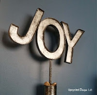 http://www.upcycleddesignlab.com/2015/12/upcycled-cardboard-faux-metal-letters-holiday-decoration.html