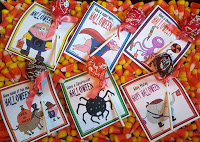 http://joyfuldaisy.com/free-downloadable-trick-or-treat-sucker-cards/