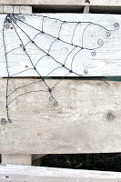 http://theseamanmom.com/how-to-make-a-wire-spider-web/