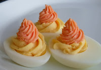 http://happierthanapiginmud.blogspot.com/2015/10/candy-corn-deviled-eggs.html