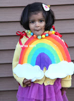 http://www.smilingcolors.com/2015/10/how-to-make-a-rainbow-costume-no-sew-video/