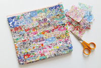 http://www.madforfabric.com/2015/10/03/diy-laminate-liberty-scrap-pouch/