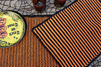 http://olives-n-okra.com/halloween-tunisian-crochet-placemats-tutorial/