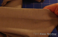 http://www.easysewingforbeginners.com/project/how-to-hem-pants-by-hand/