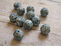 http://www.thechillydog.com/2015/08/clay-tutorial-applying-canes-to-beads.html