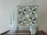 https://frommycarolinahome.wordpress.com/2015/05/31/forest-paths-mini-quilt/