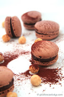 http://giraffescanbake.com/chocolate-and-hazelnut-macarons/