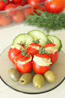 http://theseamanmom.com/stuffed-tomatoes-with-eggplant/