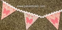 http://www.piecedbrain.com/2015/06/banner-with-applique-tutorial.html