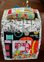 http://www.patchworkposse.com/arm-chair-pin-cushion-and-sewing-pocket-tutorial/