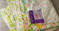 http://www.patchworkposse.com/vintage-hankies-baby-quilt-pattern/