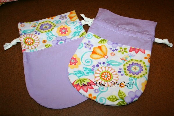 http://www.supermomnocape.com/2014/08/28/how-to-make-two-drawstring-bags-from-two-fqs/