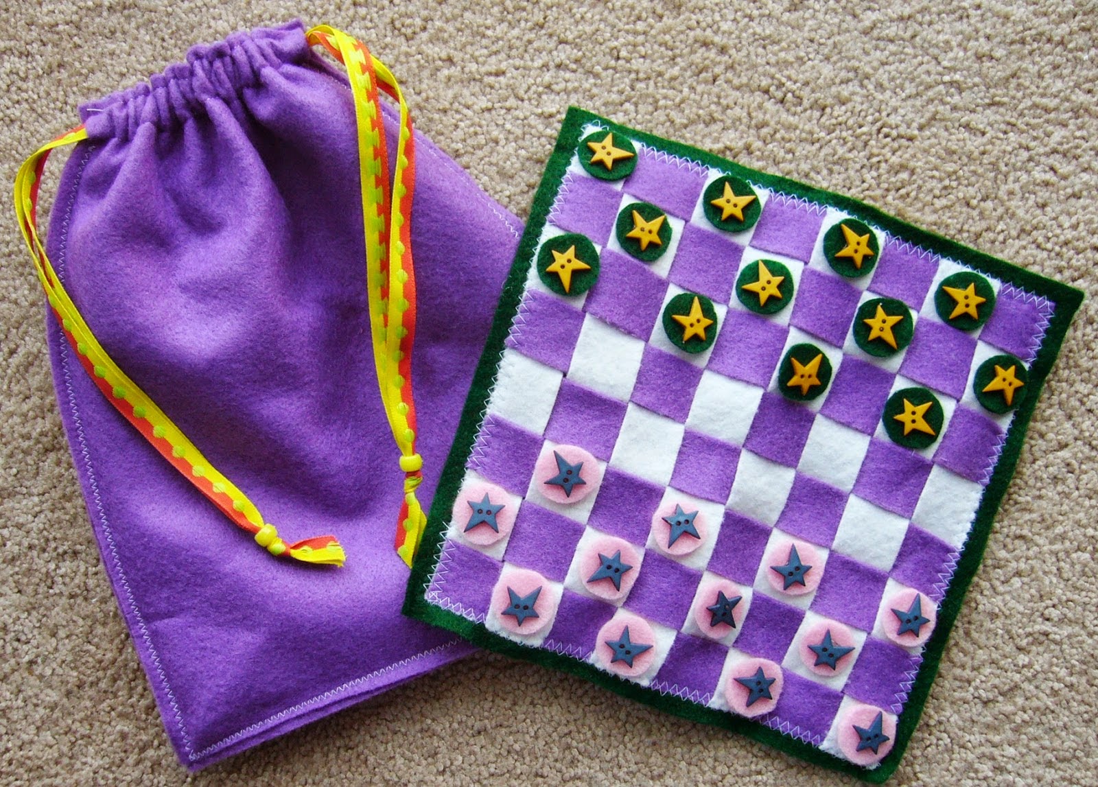 http://www.simplyshoeboxes.com/2015/01/diy-travel-checkers-game-with.html