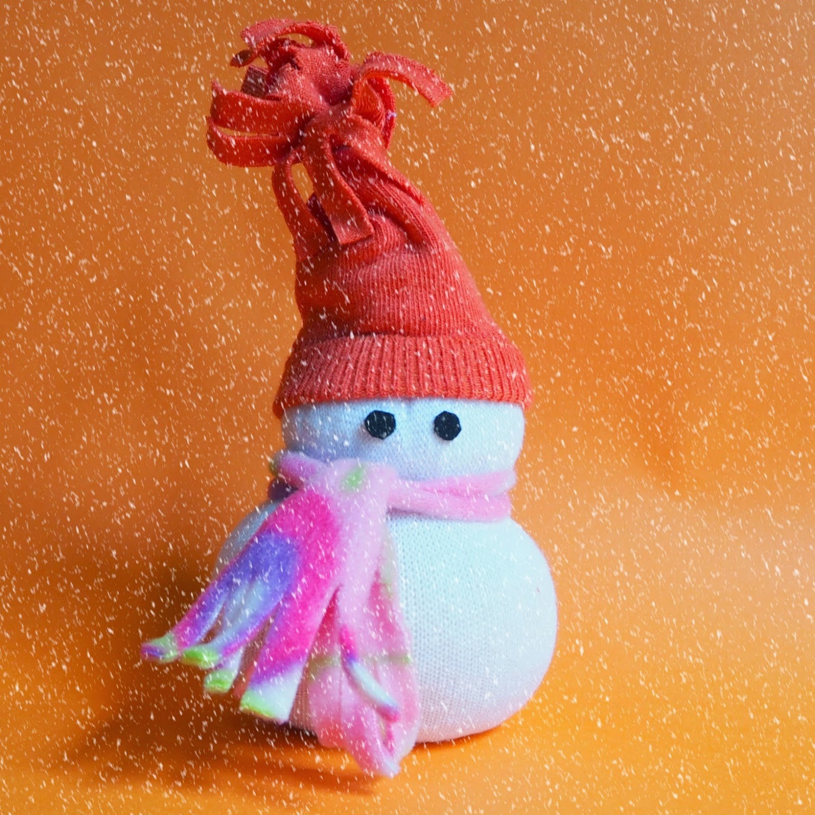 http://www.colouredbuttons.com/2014/11/no-sew-sock-snowman-from-downunder.html