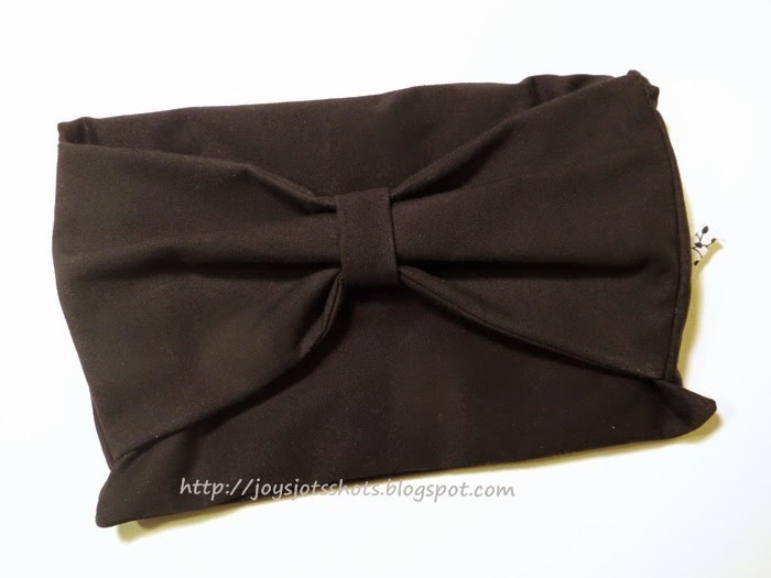 http://joysjotsshots.blogspot.com/2015/01/joys-folded-bow-clutch.html