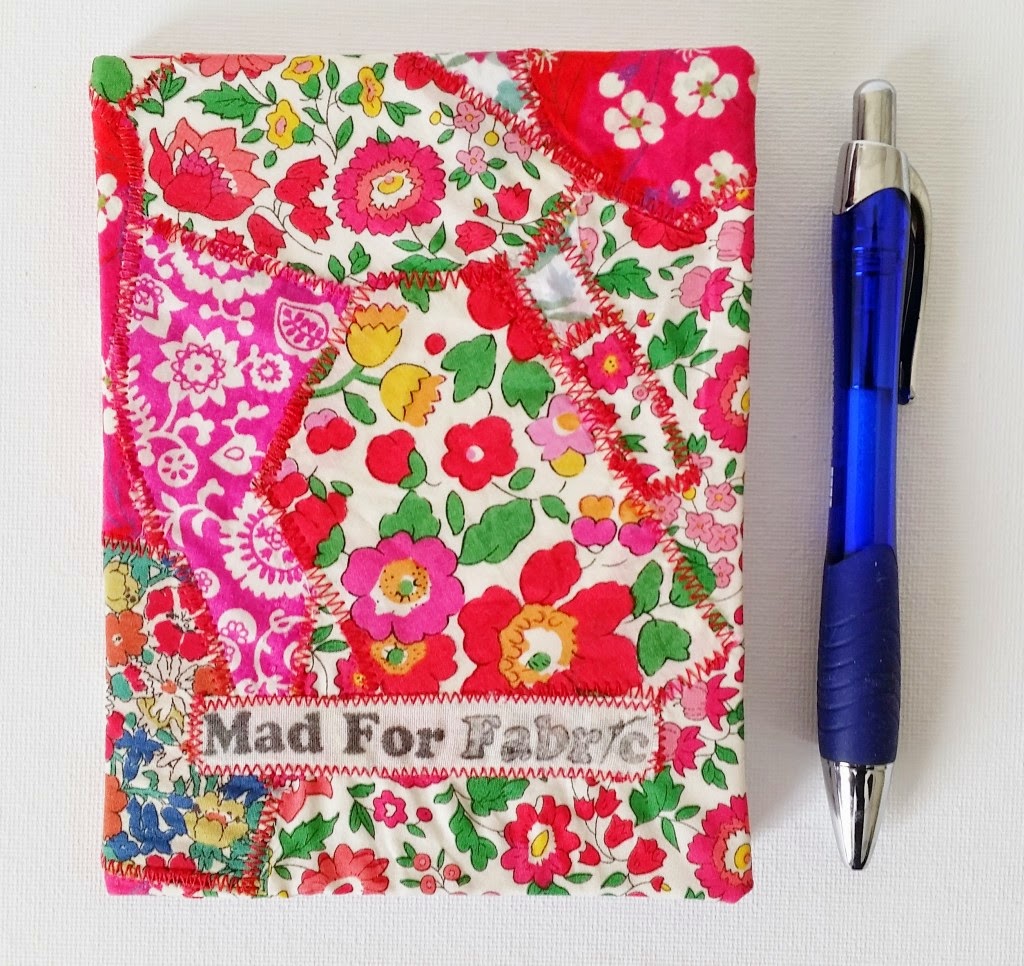 http://www.madforfabric.com/2014/12/31/diy-fabric-covered-mini-notebook-tutorial/