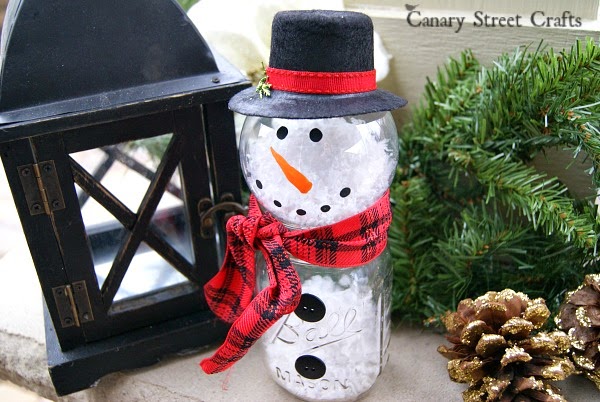 http://canarystreetcrafts.com/mason-jar-snowman/