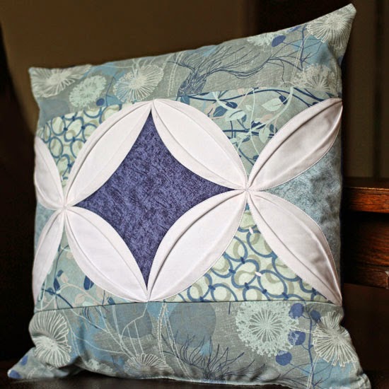 http://so-sew-easy.com/make-cathedral-window-cushion/