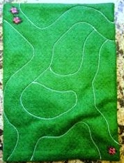 http://www.simplyshoeboxes.com/2012/07/felt-frenzy-felt-marble-maze-diy-how-to.html