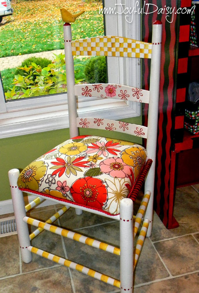 http://joyfuldaisy.com/whisical-hand-painted-furniture-rubber-stamped-chair/