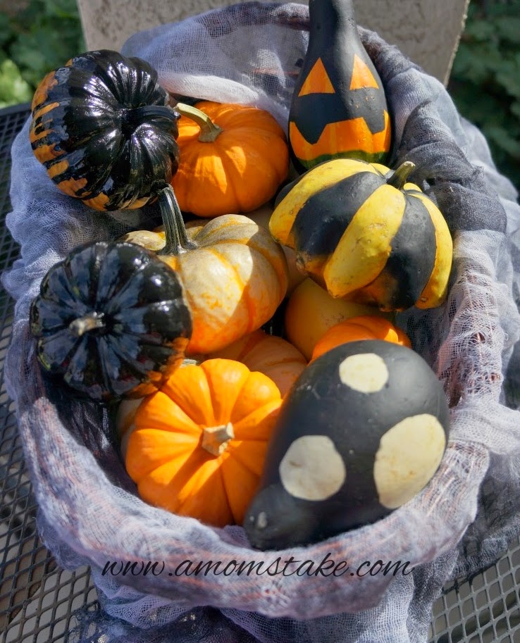 http://www.amomstake.com/2014/09/how-to-paint-pumpkins-halloween/