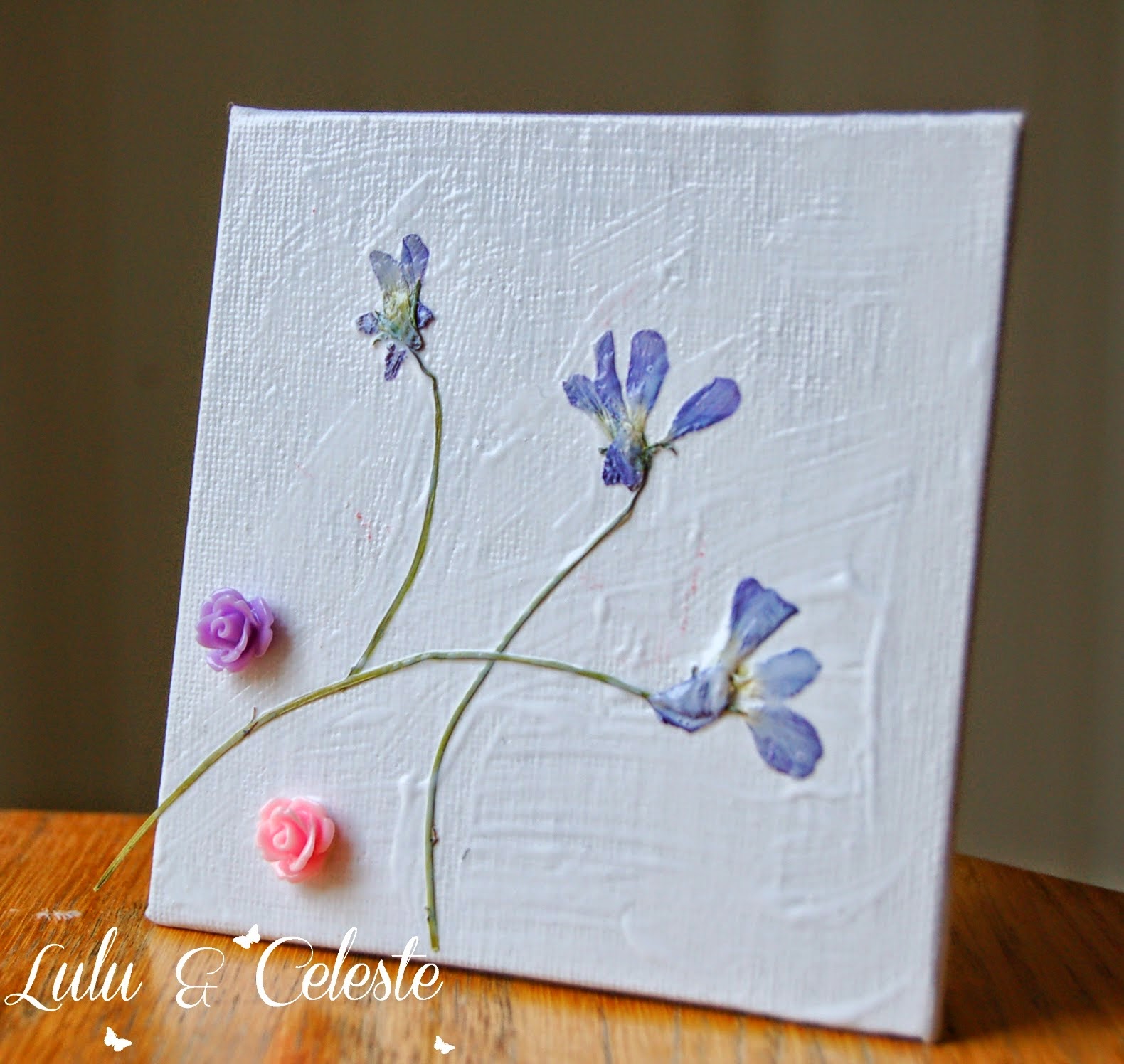 http://luluandceleste.blogspot.ca/2014/07/pressed-flower-artwork-for-children.html