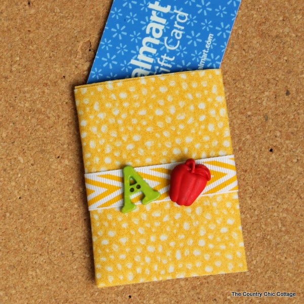 http://www.thecountrychiccottage.net/2014/03/duck-tape-fabric-gift-card-pouch.html