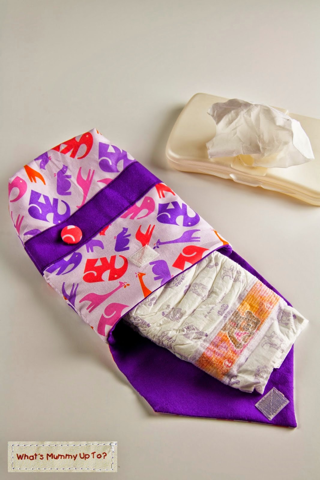 http://whatsmummyupto.blogspot.com.au/2014/05/tutorial-envelope-style-nappydiaper.html