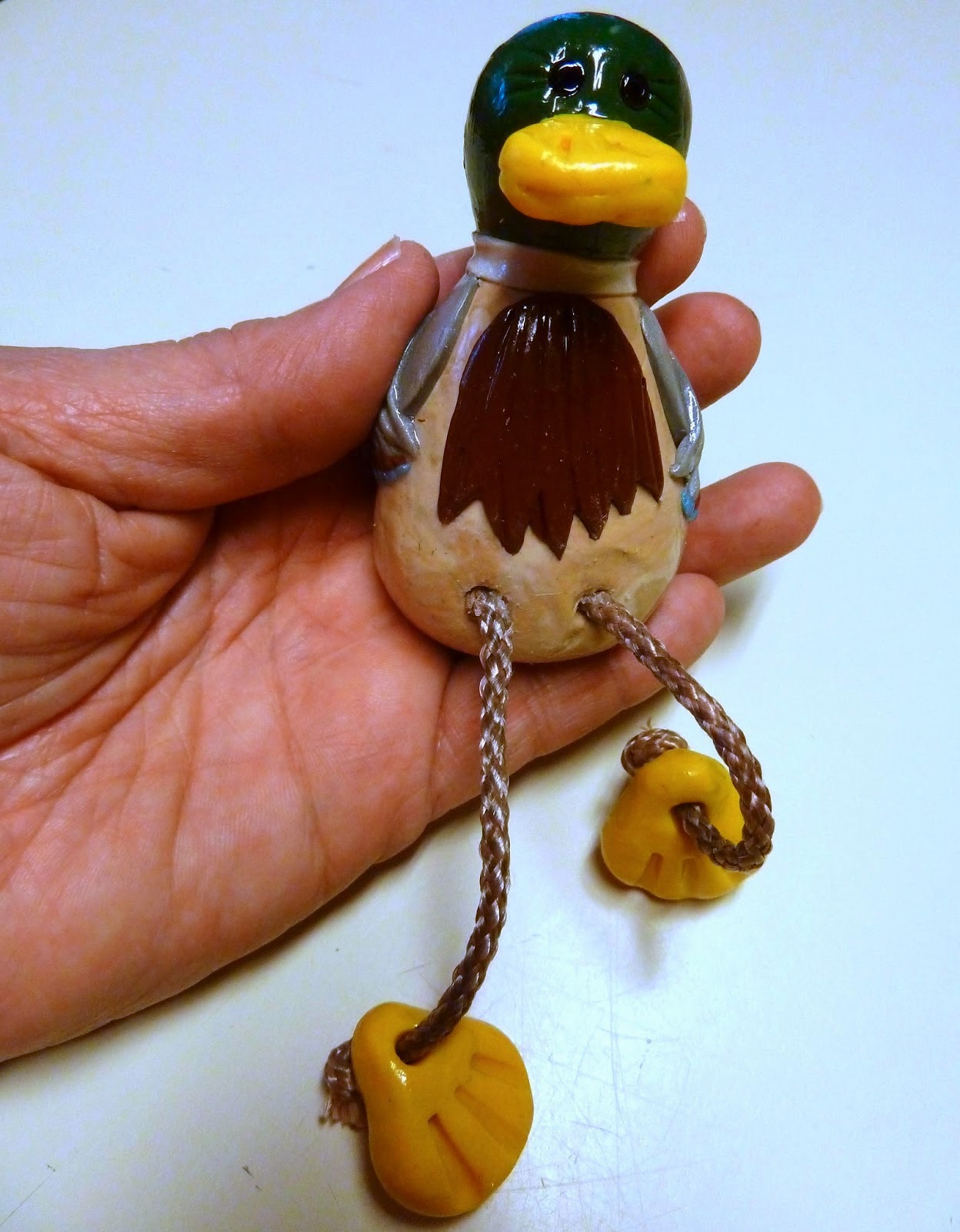 http://www.makeiteasycrafts.com/2014/03/sculpey-oven-baked-clay-sitting-duck.html