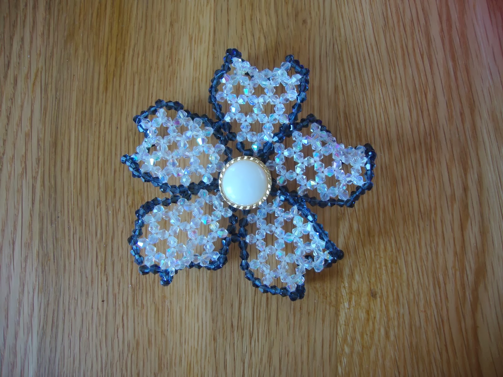 http://strawberrybox-serenie.blogspot.co.uk/2014/03/beaded-flower-brooch.html