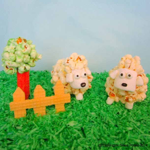 http://grasspotato.wordpress.com/2014/02/16/how-to-make-lamb-figurines-with-caramel-popcorn-balls/