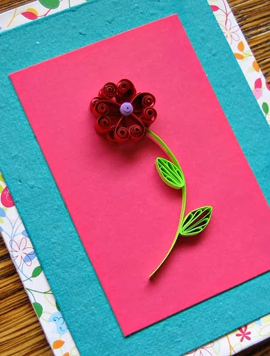 http://www.allthingspaper.net/2014/01/quilled-valentine-flower-card-tutorial.html