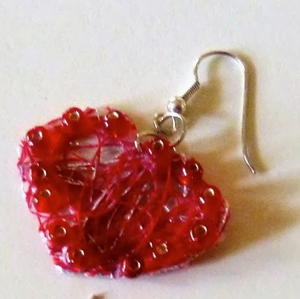 http://www.makeiteasycrafts.com/2014/01/stiffened-thread-valentine-heart.html