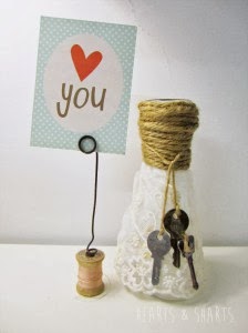 http://heartsandsharts.com/vintage-photo-holders/