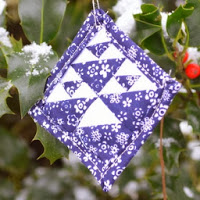 http://mychellem.blogspot.com/2013/12/dutchmans-puzzle-ornament-tutorial.html