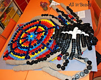 http://allinbeads.blogspot.com/2013/11/plastic-bottle-caps-not-like-beads-but.html